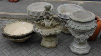 Lot 1132 - A pair of reconstituted stone circular...