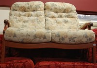 Lot 1161 - A contemporary Ercol mid elm floral...