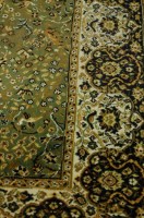 Lot 1165 - A Persian style machine woven green ground...