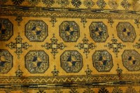 Lot 1168 - A Persian woollen bokhara having twin rows of...