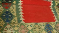 Lot 1175 - A Persian woollen kilim rug