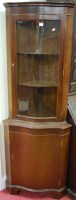 Lot 1178 - A reproduction mahogany serpentine front...