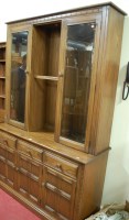 Lot 1182 - A contemporary Ercol and mid elm wall unit,...
