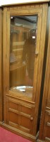 Lot 1185 - A contemporary Ercol mid elm freestanding...