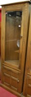 Lot 1186 - A contemporary Ercol mid elm freestanding...