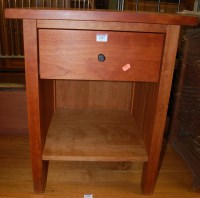 Lot 1205 - A pair of American cherrywood single drawer...