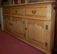 Lot 1206 - A contemporary joined light oak sideboard in...
