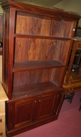 Lot 1207 - A contemporary hardwood freestanding open...