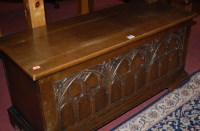 Lot 1302 - A moulded oak hinge-top low blanket box,...