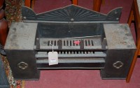 Lot 1313 - A circa 1900 cast iron fire basket; together...