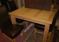 Lot 1321 - A contemporary light elm rectangular dining...