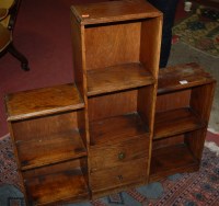 Lot 1322 - A 1930s oak low freestanding open bookshelf,...