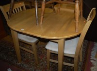Lot 1324 - A contemporary rubberwood kitchen table,...