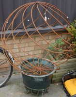 Lot 1146 - A small later painted cast iron circular VAT...