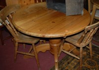 Lot 1327 - A modern pine extending kitchen table, having...