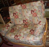 Lot 1355 - A contemporary Ercol light elm and floral...