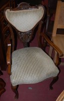 Lot 1357 - An Edwardian walnut and striped upholstered...
