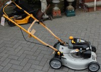 Lot 1143 - A Ryobi 140cc petrol driven lawnmower