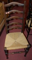 Lot 1369 - A set of four early 20th century oak and rush...