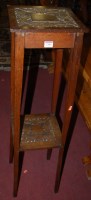 Lot 1393 - An early 20th century oak two tier plant stand...