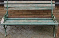 Lot 1136 - A green painted cast metal and slatted teak...