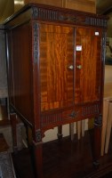 Lot 1407 - An Adams style mahogany double door side...