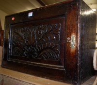 Lot 1413 - An antique Continental joined oak single door...