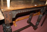 Lot 1415 - A joined oak hall table raised on bulbous...