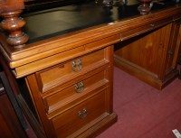 Lot 1423 - A contemporary pine and rexine inset twin...