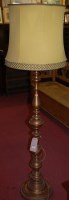 Lot 1424 - A Baroque style turned giltwood standard lamp...