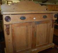 Lot 1438 - A Victorian pine ledgeback double door side...