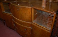 Lot 1441 - A 1930s figured walnut veneered ledgeback...