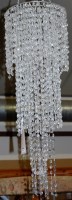 Lot 1284 - A pair of wirework and faceted clear plastic...