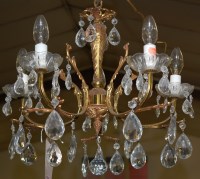 Lot 1285 - A gilt metal five light hanging electrolier,...