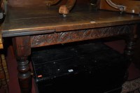Lot 1306 - An antique joined oak drawleaf refectory table,...