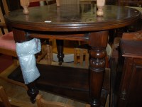 Lot 1308 - A circa 1900 oak extending dining table,...