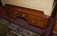 Lot 1403 - A Victorian mahogany round cornered kneehole...