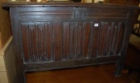 Lot 1399 - A late 17th century joined oak three panelled...