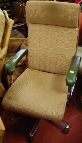 Lot 1401 - A 1960s plywood, chrome and upholstered swivel...