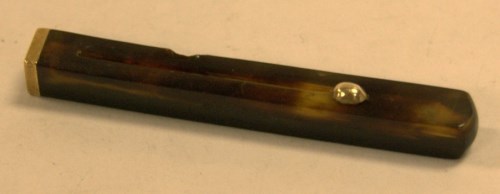 Lot 511 - A tortoiseshell and 15ct gold tooth-pick,...