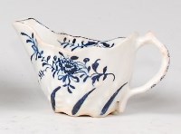 Lot 1088 - A Lowestoft porcelain cream jug, the moulded...