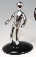 Lot 139 - A contemporary chromed and plastic Voodoo...