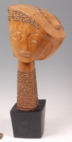Lot 144 - Contemporary Russian school - A carved walnut...