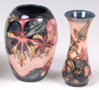 Lot 12 - A small contemporary Moorcroft pottery vase in...