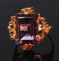 Lot 62 - A modern 14ct gold and amethyst dress ring,...