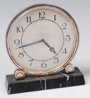 Lot 105 - A French Art Deco silver plated mantel clock,...