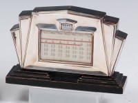 Lot 108 - An Art Deco ebonised and silver mounted desk...