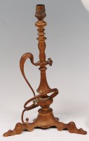Lot 119 - An Arts & Crafts brass table lamp in the...