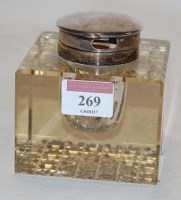 Lot 269 - An Edwardian cut glass and silver mounted inkwell