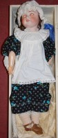 Lot 737 - An early 20th century bisque headed doll,...